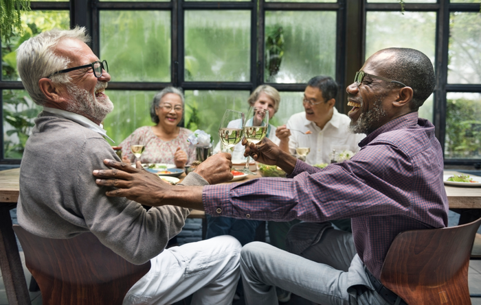 Mature friends at a dinner party