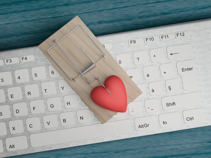 keyboard with heart in a trap