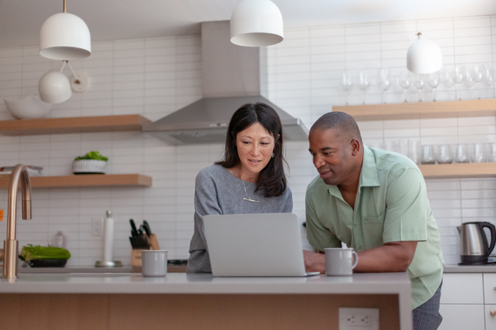 Husband and wife working on taxes