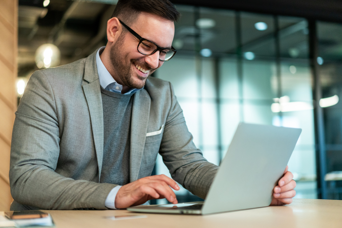 Young businessman working at office