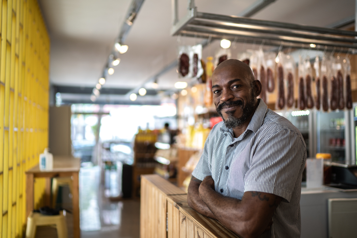 Portrait of a happy small business owner