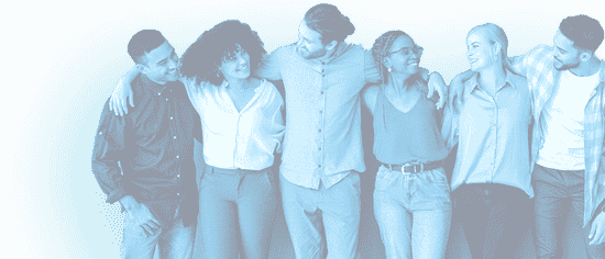 Diverse group of young professionals smiling with arms around each others' shoulders