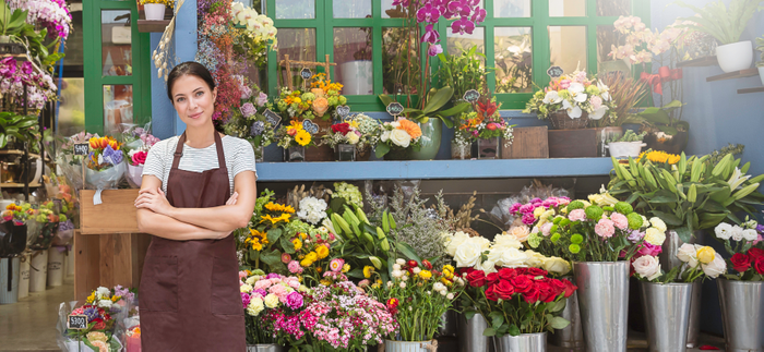 Startup successful sme small business entrepreneur owner asian woman standing with flowers at florist shop. Portrait of caucasian girl successful owner environment friendly concept banner