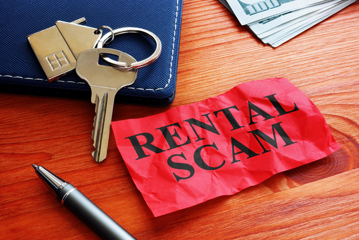 Rental scam memo about fraud and home key.