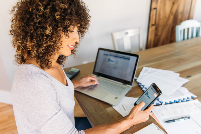 Woman filing taxes at computer