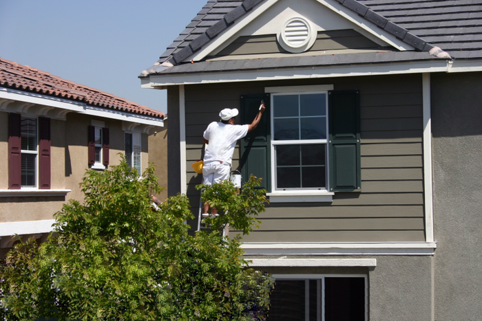 property manager repairing a home