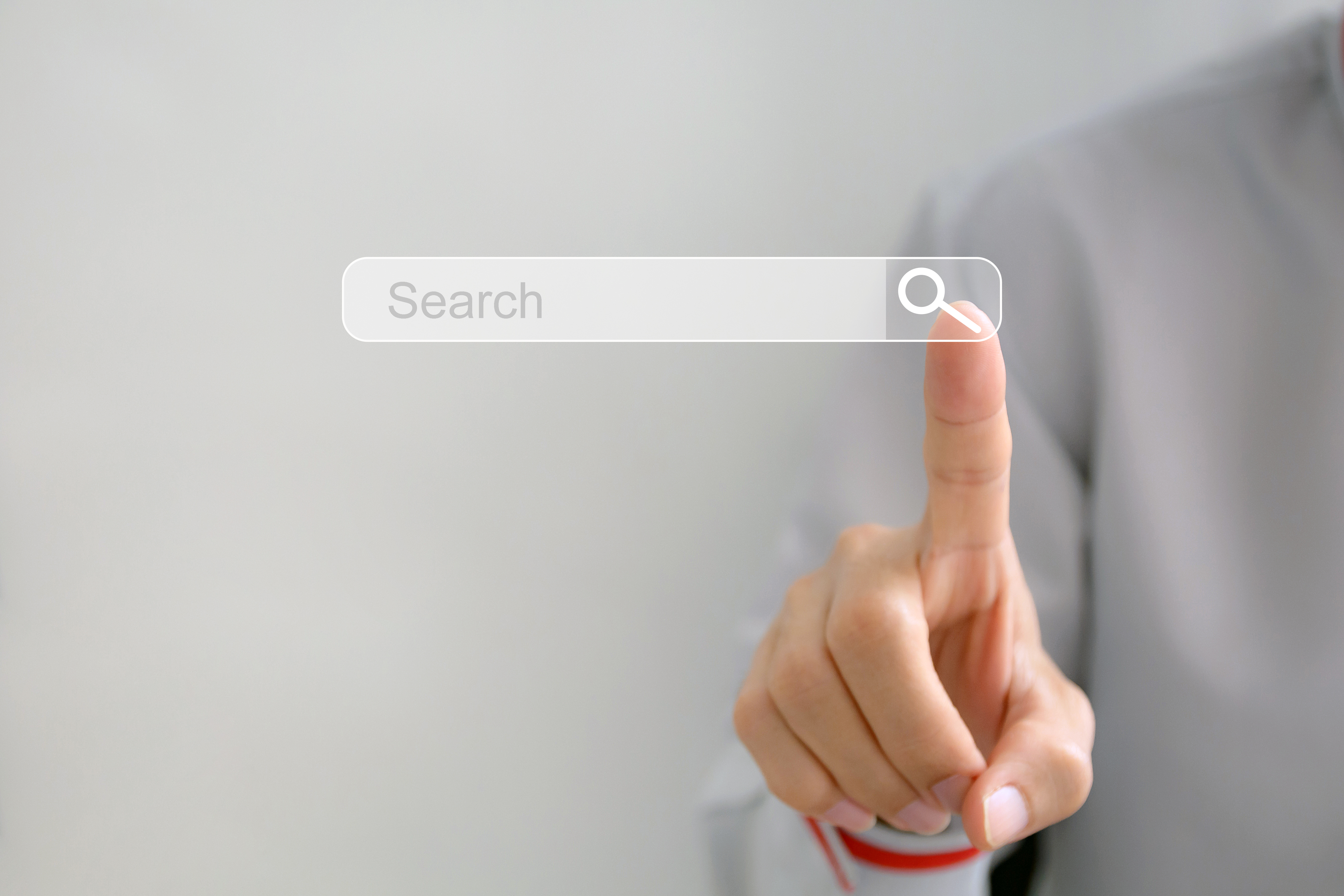 Searching Browsing Internet Data Information Networking Concept,Business man clicking internet search page on computer touch screen,copy space.