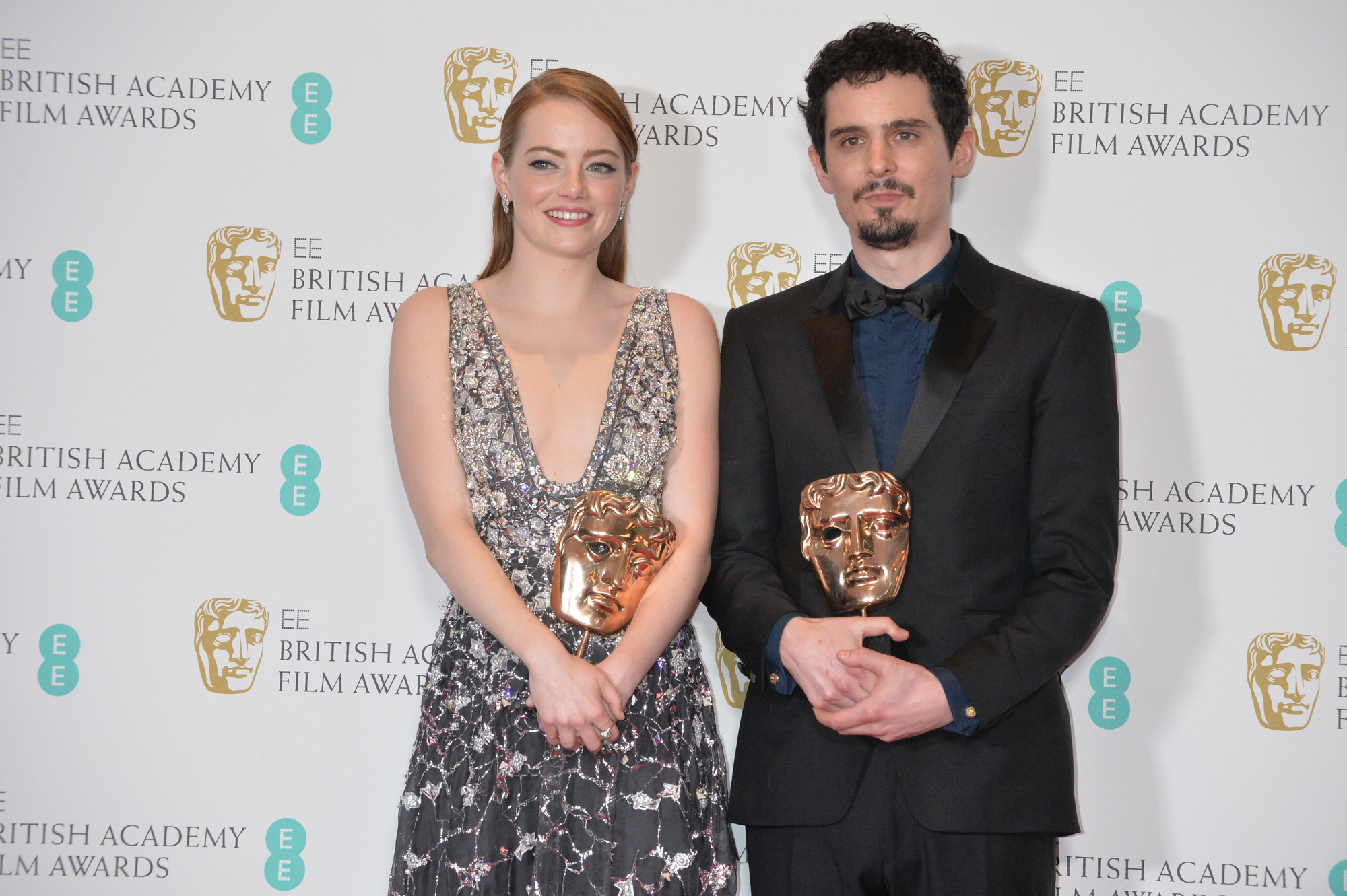 Winners of Best Director, Damien Chazelle and Best Actress, Emma Stone for La La Land.